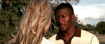 Movie still from “All the Boys Love Mandy Lane” (2006), directed by Jonathan Levine – A man and a woman talking to each other; Close Up shot, Over the shoulder angle