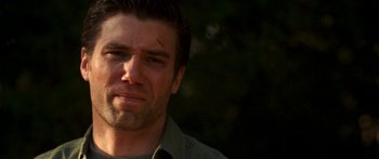 Movie still from “All the Boys Love Mandy Lane” (2006), directed by Jonathan Levine – A person wearing a shirt; Close Up shot, Low angle