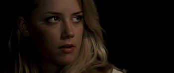 Movie still from “All the Boys Love Mandy Lane” (2006), directed by Jonathan Levine – A person's eyes and face; Close Up shot, Over the shoulder angle