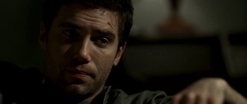 Movie still from “All the Boys Love Mandy Lane” (2006), directed by Jonathan Levine – A man's face in the dark; Close Up shot, Over the shoulder angle