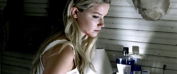 Movie still from “All the Boys Love Mandy Lane” (2006), directed by Jonathan Levine – A beautiful young lady sitting in front of a mirror; Close Up shot, Low angle