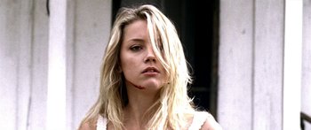 Movie still from “All the Boys Love Mandy Lane” (2006), directed by Jonathan Levine – A woman with a wound on her face and neck; Close Up shot, Low angle