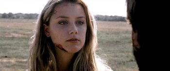 Movie still from “All the Boys Love Mandy Lane” (2006), directed by Jonathan Levine – A young woman with blood all over her face; Close Up shot, Low angle