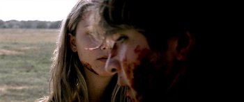 Movie still from “All the Boys Love Mandy Lane” (2006), directed by Jonathan Levine – A woman with blood all over her face; Extreme Close Up shot, Over the shoulder angle