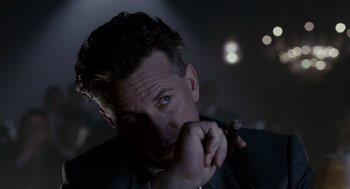 Movie still from “All the King's Men” (2006), directed by Steven Zaillian – A person holding a knife in his hand; Close Up shot, Low angle