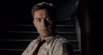 Movie still from “All the King's Men” (2006), directed by Steven Zaillian – A person wearing a shirt and a tie; Close Up shot, Low angle