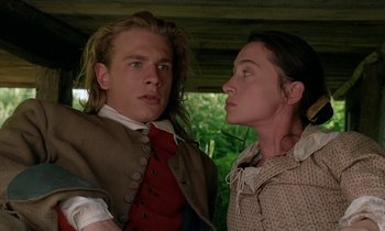 Movie still from “Tous les matins du monde” (1991), directed by Alain Corneau – A man and a woman standing next to each other; Medium shot, Low angle