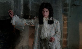 Movie still from “Tous les matins du monde” (1991), directed by Alain Corneau – A man dressed as a renaissance man in a period costume; Medium shot, Over the shoulder angle