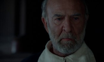 Movie still from “Tous les matins du monde” (1991), directed by Alain Corneau – An old man with a beard is looking at the camera; Close Up shot, Over the shoulder angle