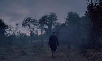 Movie still from “Tous les matins du monde” (1991), directed by Alain Corneau – An old man is walking through a field; Extreme Wide shot, Low angle