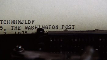 A typewriter with the words washington post printed on it