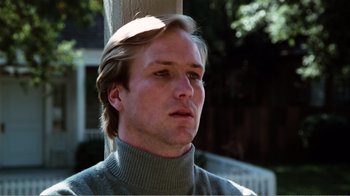 Movie still from “Altered States” (1980), directed by Ken Russell – A person wearing a sweater; Close Up shot, Low angle