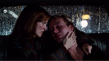 Movie still from “Altered States” (1980), directed by Ken Russell – A man and a woman are looking at one another; Close Up shot, Low angle