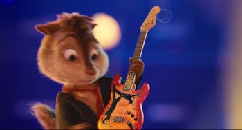 Movie still from “Alvin and the Chipmunks: The Squeakquel” (2009), directed by Betty Thomas – A chipmunk holding a guitar in his hands; Close Up shot, High angle