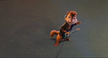 Movie still from “Alvin and the Chipmunks: The Squeakquel” (2009), directed by Betty Thomas – A chipmunk is holding a guitar in his hands; Medium shot, High angle