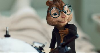 Movie still from “Alvin and the Chipmunks: The Squeakquel” (2009), directed by Betty Thomas – A chipmunk wearing glasses and a black shirt; Close Up shot, Over the shoulder angle