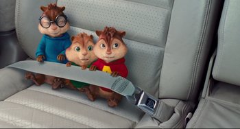 Movie still from “Alvin and the Chipmunks: The Squeakquel” (2009), directed by Betty Thomas – A group of chipmunks sitting in the back seat of a car; Medium shot, High angle
