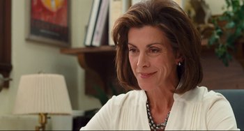 Movie still from “Alvin and the Chipmunks: The Squeakquel” (2009), directed by Betty Thomas – A person sitting in a room; Close Up shot, Over the shoulder angle