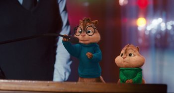 Movie still from “Alvin and the Chipmunks: The Squeakquel” (2009), directed by Betty Thomas – A couple of chipmunks are standing next to each other; Medium shot, Over the shoulder angle
