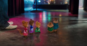 Movie still from “Alvin and the Chipmunks: The Squeakquel” (2009), directed by Betty Thomas – A group of chipmunks figurines standing in a row; Wide shot, High angle
