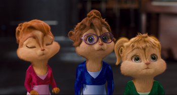 Movie still from “Alvin and the Chipmunks: The Squeakquel” (2009), directed by Betty Thomas – A group of people standing next to each other; Close Up shot, Low angle