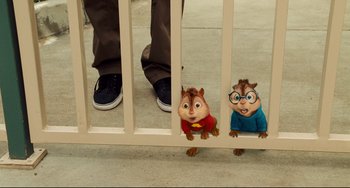 Movie still from “Alvin and the Chipmunks: The Squeakquel” (2009), directed by Betty Thomas – A couple of chipmunks standing next to each other on the ground; Wide shot, High angle