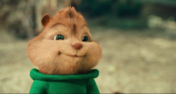 Movie still from “Alvin and the Chipmunks: The Squeakquel” (2009), directed by Betty Thomas – A stuffed animal chipmunk wearing a green shirt; Medium shot, Low angle