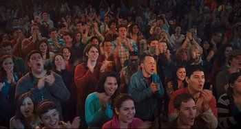 Movie still from “Alvin and the Chipmunks: The Squeakquel” (2009), directed by Betty Thomas – A group of people in a room watching a show; Wide shot, High angle