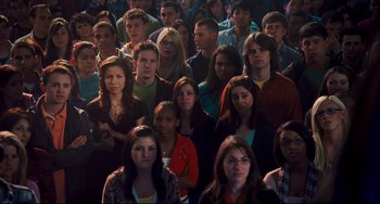 Movie still from “Alvin and the Chipmunks: The Squeakquel” (2009), directed by Betty Thomas – A group of people standing in front of each other; Medium shot, High angle