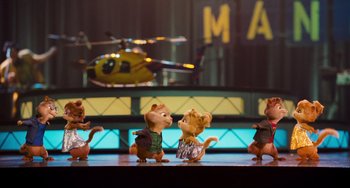 Movie still from “Alvin and the Chipmunks: The Squeakquel” (2009), directed by Betty Thomas – A couple of chipmunks standing next to each other on a stage; Wide shot, Low angle