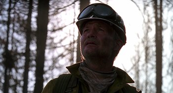 Movie still from “Always” (1989), directed by Steven Spielberg – A person wearing a helmet; Close Up shot, Low angle