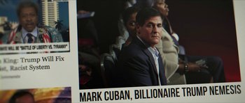 Movie still from “American Dharma” (2018), directed by Errol Morris – A person wearing a suit and tie; Close Up shot, Low angle