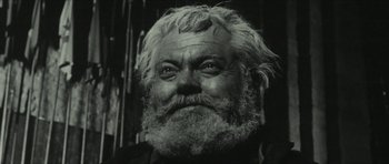 Movie still from “American Dharma” (2018), directed by Errol Morris – An old man with a beard and a mustache; Close Up shot, Low angle