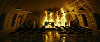 Movie still from “American Dharma” (2018), directed by Errol Morris – A room that has a lot of chairs in it; Extreme Wide shot, High angle