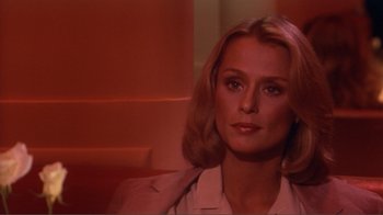 Movie still from “American Gigolo” (1980), directed by Paul Schrader – A person wearing a jacket; Close Up shot, Over the shoulder angle