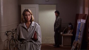 Movie still from “American Gigolo” (1980), directed by Paul Schrader – A man and a woman standing in front of each other; Medium shot, Over the shoulder angle