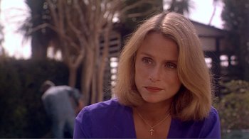 Movie still from “American Gigolo” (1980), directed by Paul Schrader – A person wearing a purple shirt; Close Up shot, Over the shoulder angle