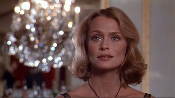 Movie still from “American Gigolo” (1980), directed by Paul Schrader – A person wearing a necklace; Close Up shot, Over the shoulder angle