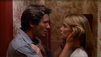 Movie still from “American Gigolo” (1980), directed by Paul Schrader – A man and a woman looking at one another; Close Up shot, Low angle