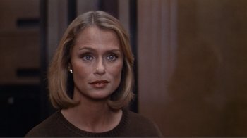 Movie still from “American Gigolo” (1980), directed by Paul Schrader – A person wearing a brown sweater; Close Up shot, Over the shoulder angle