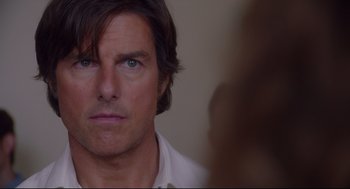 Movie still from “American Made” (2017), directed by Doug Liman – A person looking at the camera; Close Up shot, Over the shoulder angle