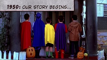 Movie still from “American Splendor” (2003), directed by Shari Springer Berman – A group of kids dressed up in halloween costumes; Wide shot, Low angle