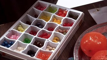 Movie still from “American Splendor” (2003), directed by Shari Springer Berman – A box filled with jelly beans; Extreme Close Up shot, High angle