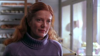 Movie still from “American Splendor” (2003), directed by Shari Springer Berman – A person with red hair wearing a sweater; Close Up shot, Low angle