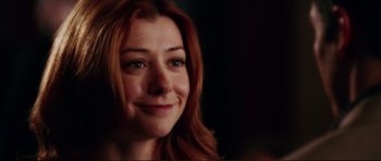 Movie still from “American Wedding” (2003), directed by Jesse Dylan – A person with long red hair; Close Up shot, Over the shoulder angle