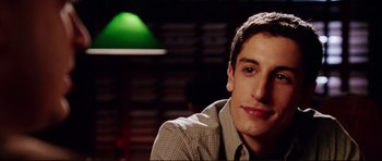 Movie still from “American Wedding” (2003), directed by Jesse Dylan – A person sitting in a room; Close Up shot, Low angle