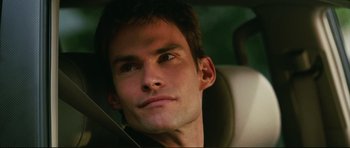 Movie still from “American Wedding” (2003), directed by Jesse Dylan – A person sitting in a car; Close Up shot, Over the shoulder angle