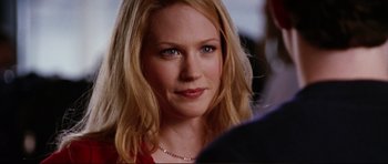 Movie still from “American Wedding” (2003), directed by Jesse Dylan – A person with blond hair and blue eyes; Close Up shot, Over the shoulder angle