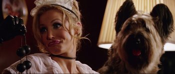Movie still from “American Wedding” (2003), directed by Jesse Dylan – A person wearing a nurse's outfit; Close Up shot, Low angle