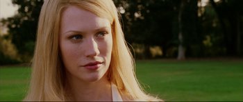 Movie still from “American Wedding” (2003), directed by Jesse Dylan – A woman's face in a park setting; Close Up shot, Over the shoulder angle